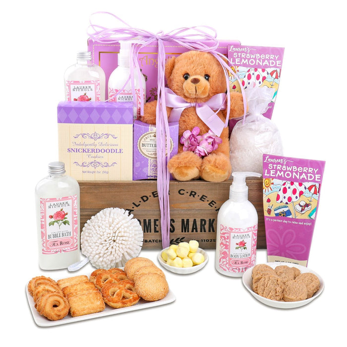 Spa gift basket with teddy bear, strawberry lemonade bottles, snickerdoodle snacks, cookies
