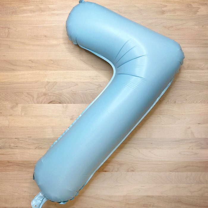 Pastel blue foil number balloon 4, 32-inch giant balloon shown from side