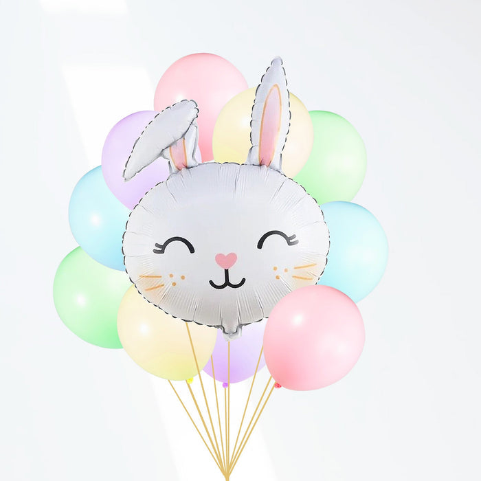 Gray bunny balloon with pastel pink, green, and blue balloons, tied with gold strings