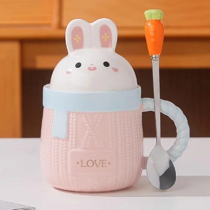 Pink bunny ceramic mug with rabbit lid, textured body, and 'LOVE' text.