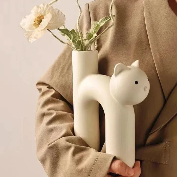 Cream ceramic cat flower vase with rounded ears, cat face dots, and top opening