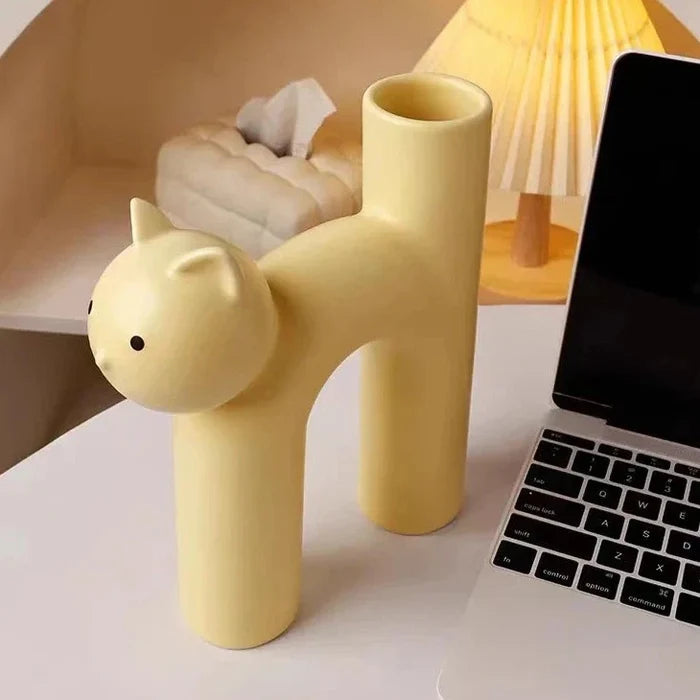 Yellow ceramic cat flower vase with raised cat head and central hollow flower opening