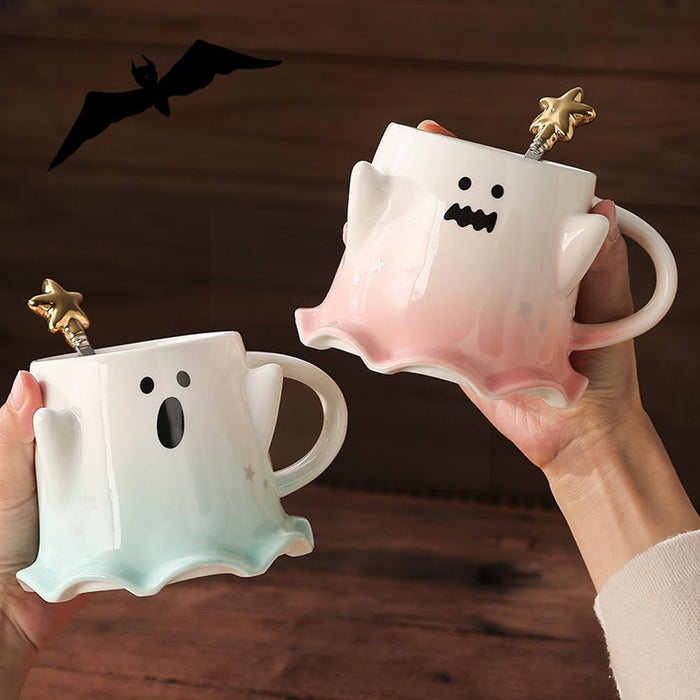 Ghost face mug with gold star-topped stirrer, shown in white and pale green tones