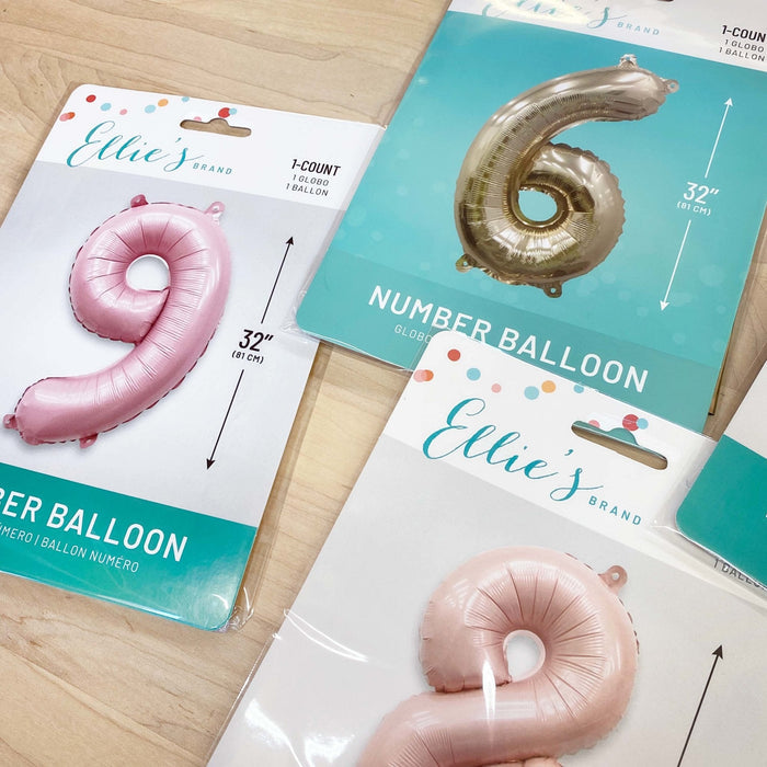 Lilac pink foil number balloons in boxed packaging, with 32-inch size markings