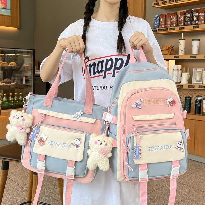 Pastel waterproof bag set with pink-and-blue mini shoulder bag and backpack