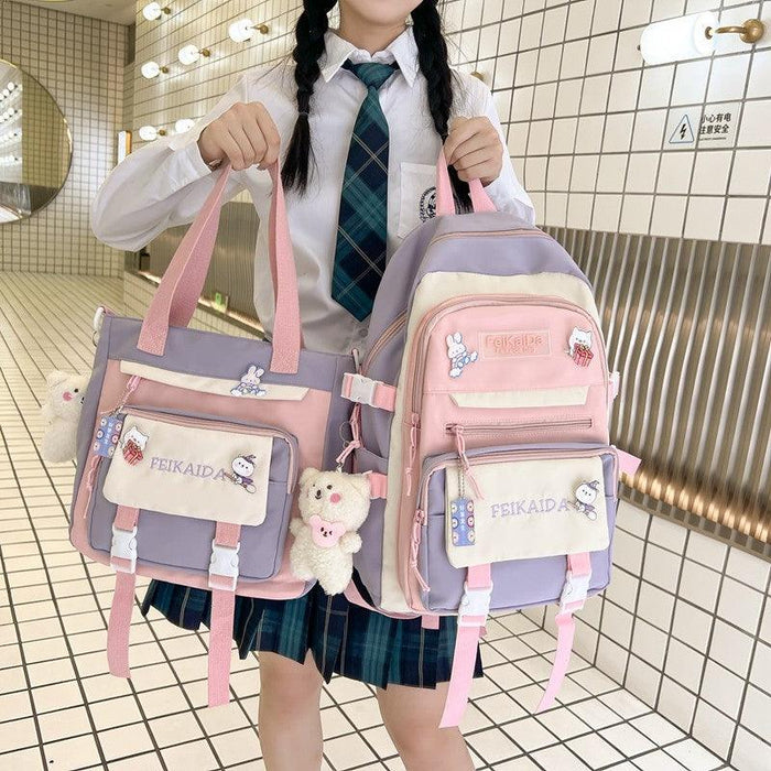 Pastel waterproof bag set with purple-and-pink mini shoulder bag and backpack