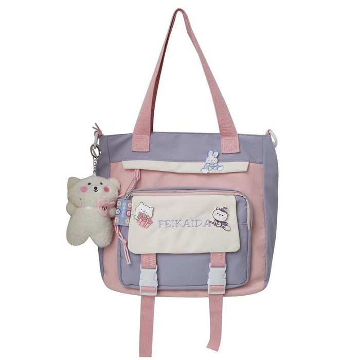 Lavender waterproof shoulder tote with front zip pocket and plush keychain charm