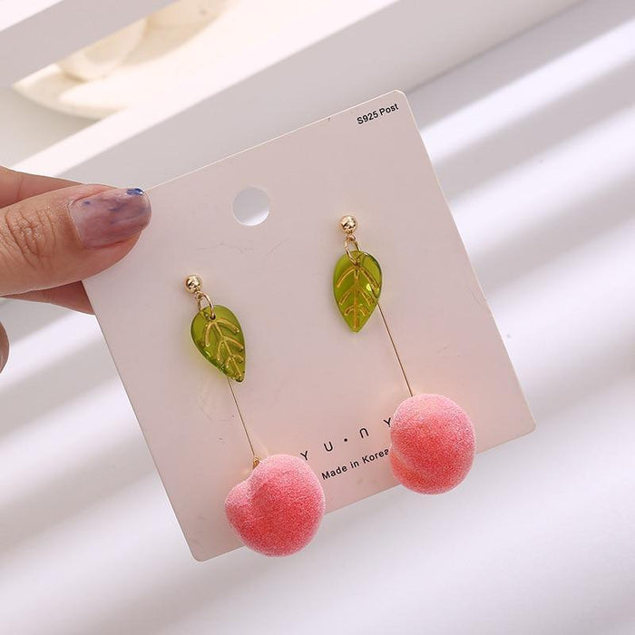 Drop earrings on card: green leaf charms with pink pom-pom balls
