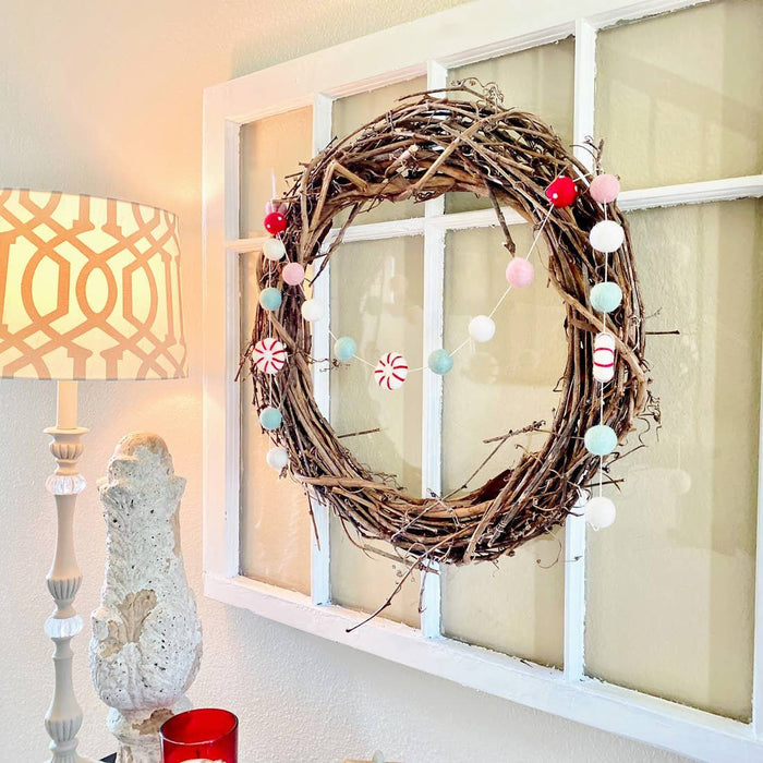 Peppermint felt ball garland wreath with woven branch ring and dangling felt balls