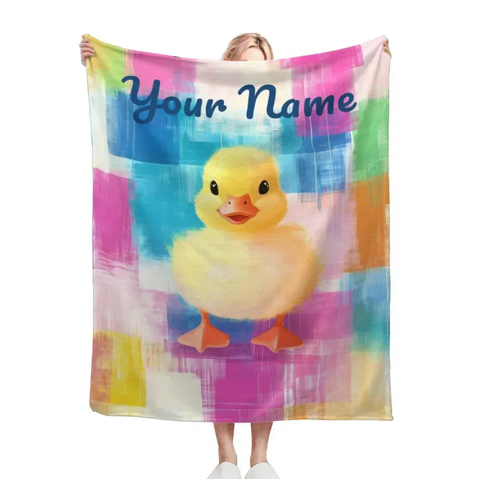 Personalized baby duckling blanket with colorful duck print and name text