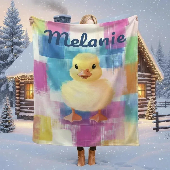 Personalized duckling blanket with colorful plaid, yellow chick graphic, name Melanie