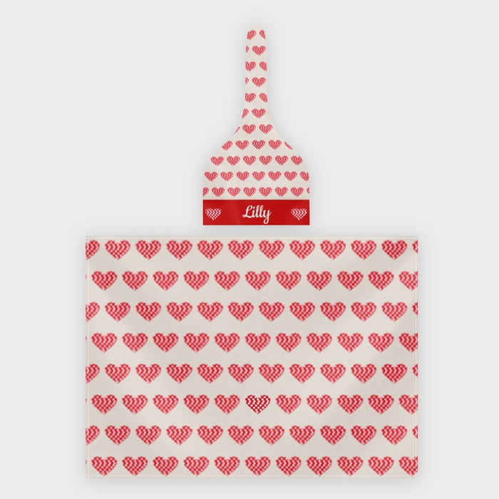 Personalized baby swaddle blanket with red heart pattern and name band