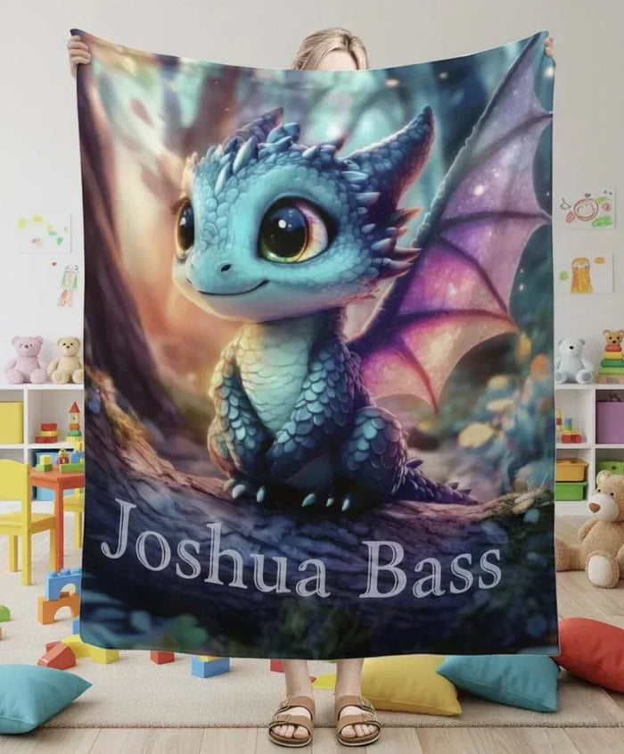 Dragon throw blanket with blue dragon graphic and name Joshua Bass