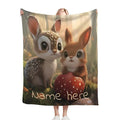 Personalized snuggle blanket with bunny and deer faces on woodland scene; “Name here”