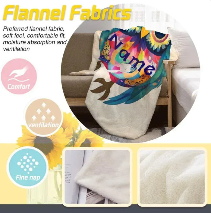 Flannel owl blanket with colorful owl print and cream fabric surface