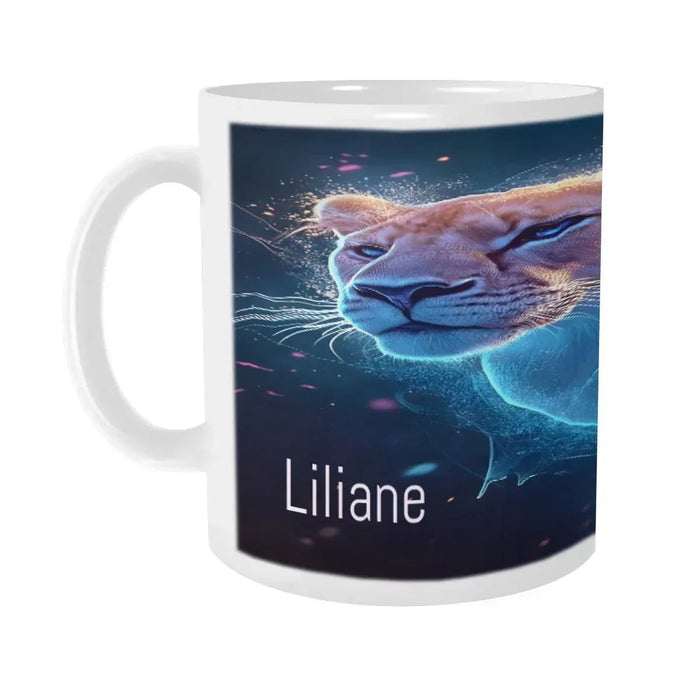 Close-up of white coffee mug with blue cat face artwork and Liliane text