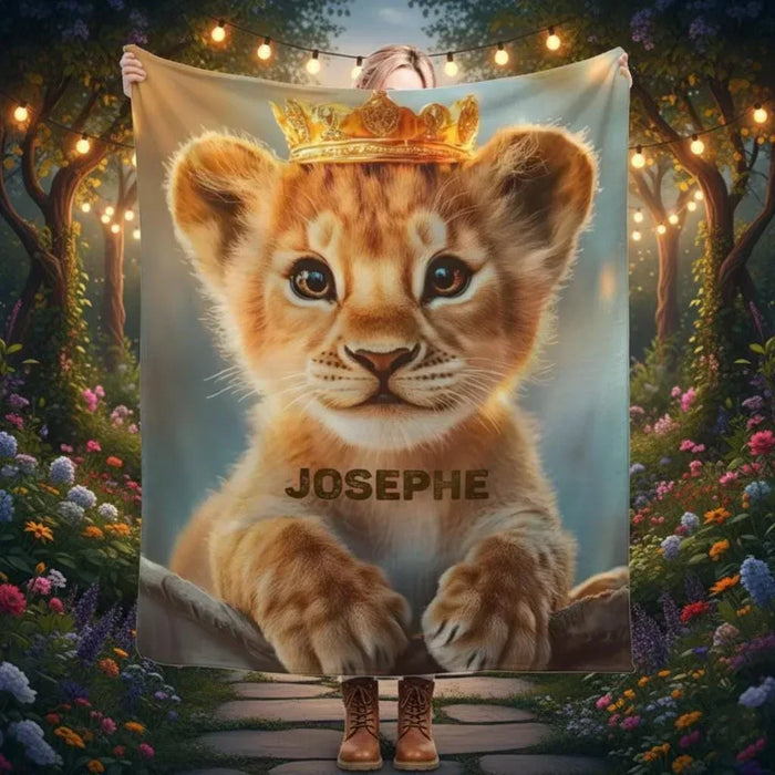 Lion cub fleece blanket with gold crown and 'JOSEPH' text across the lower panel.