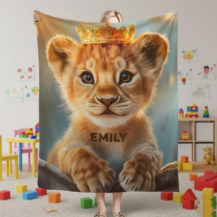 Baby lion cub blanket with crown graphic and name text "EMILY"