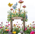 Garden metal sign stake with fairy and butterflies, floral design, reads “Sally's Garden”
