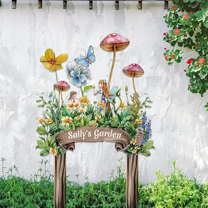 Garden metal sign stake with fairy figures, butterflies, colorful flowers, reads “Sally's Garden”