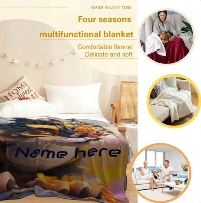 Personalized dragon flannel throw blanket on bed with animal-face print and name panel