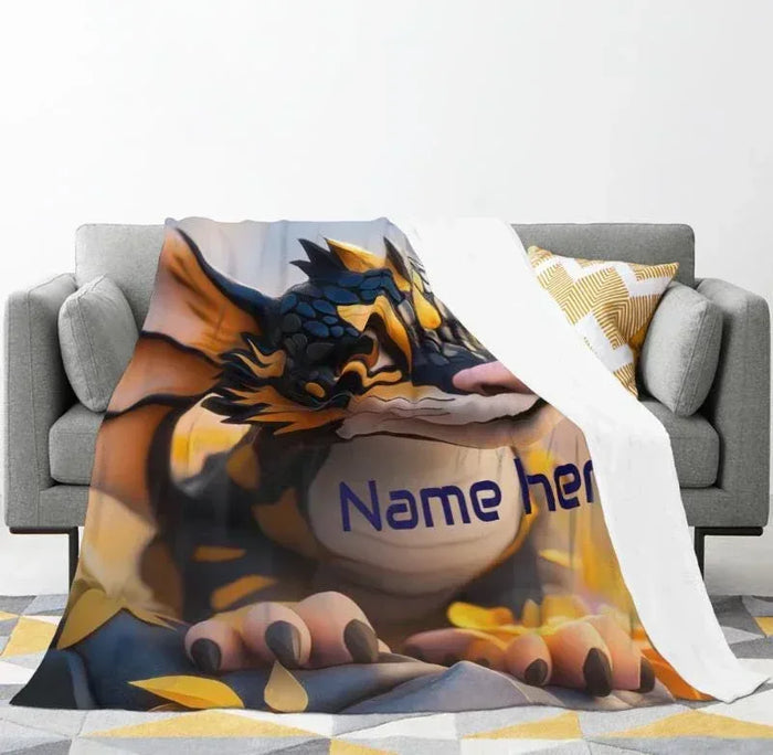 Personalized dragon flannel throw blanket draped on sofa with large animal-face print