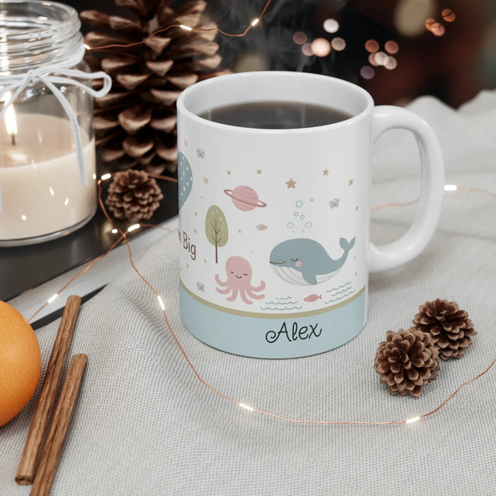 Ocean animal ceramic mug with handle, name Alex, filled with dark tea