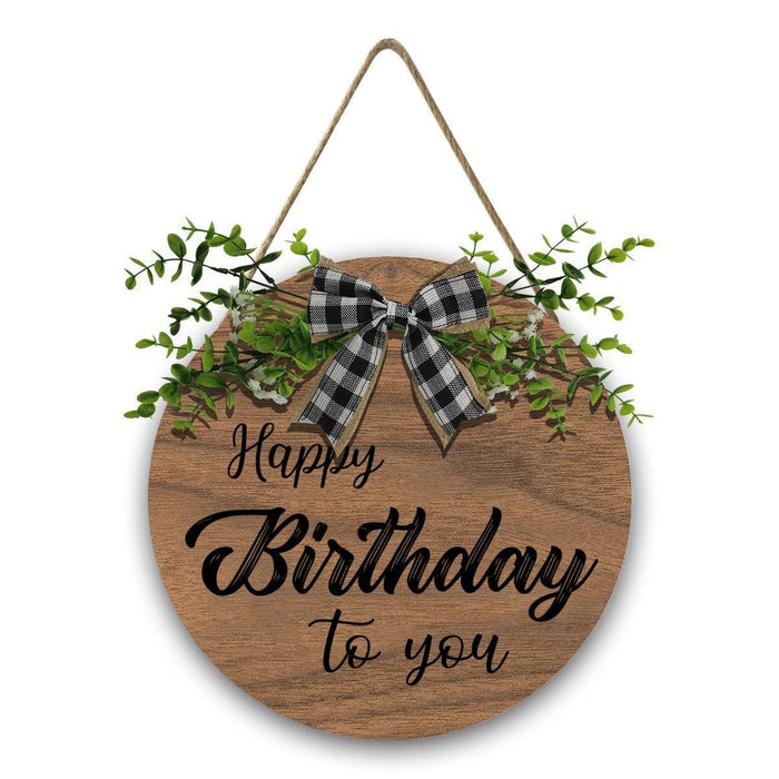 Wooden round Happy Birthday sign with linen bow and greenery wreath