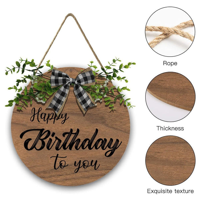 Wooden round Happy Birthday sign with rope loop, linen bow, and wood texture