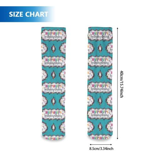 Teal birthday socks with cartoon party pattern, front and back view