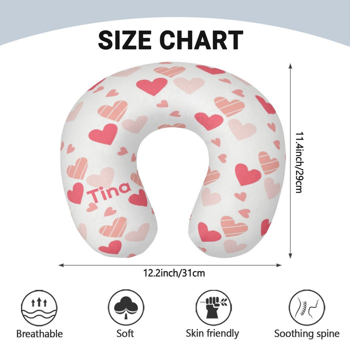 U-shaped travel neck pillow with pink heart pattern; size 12.2 x 11.4 in