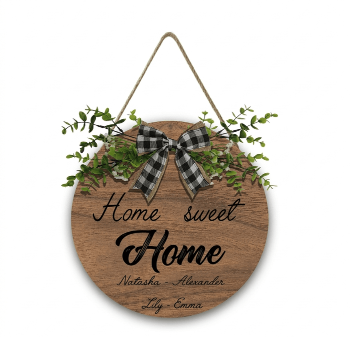 Round wooden hanging sign with rope loop, plaid bow, and “Home Sweet Home” text
