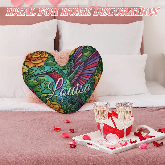Hummingbird heart decorative pillow with Louisa text on colorful winged design