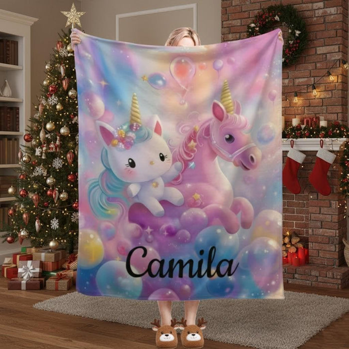 Personalized fleece blanket with unicorns and name Camila, pastel purple and blue clouds