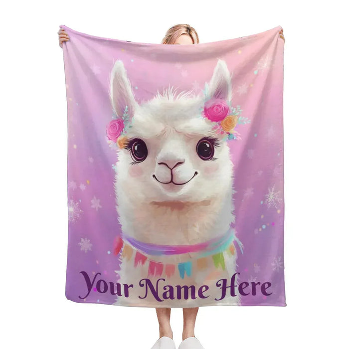 Pink fleece throw blanket with white llama face and “Your Name Here” text