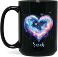 Black ceramic mug with colorful galaxy heart graphic and custom name Sarah