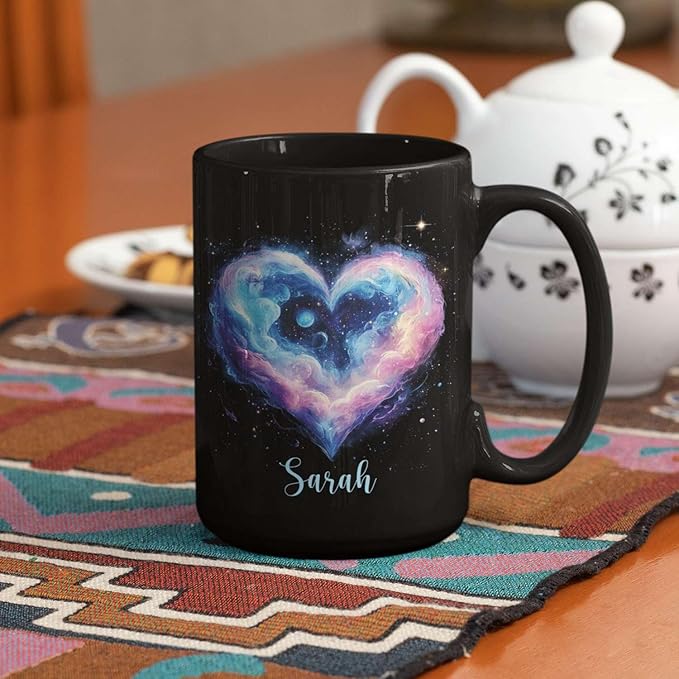 Black ceramic mug with galaxy heart print and name Sarah