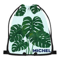 Green monstera leaf drawstring bag with black cords and personalized MICHEL name panel