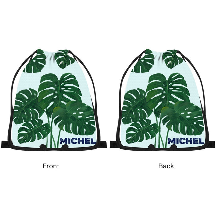Drawstring bag front and back views, green leaf print with MICHEL name