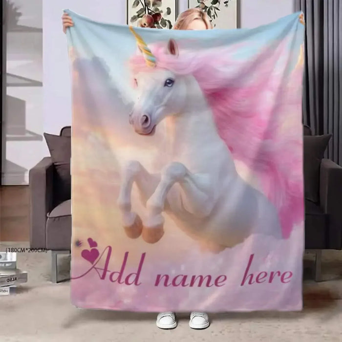 Unicorn fleece blanket with pastel pink and blue gradient and unicorn print