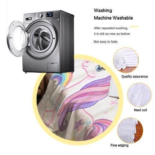 Unicorn rainbow fleece blanket fabric detail, shown as washable quality