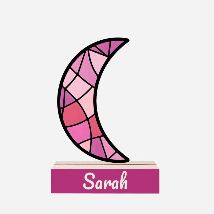 Personalized crescent moon night light with pink stained-glass pattern on wooden base, Sarah