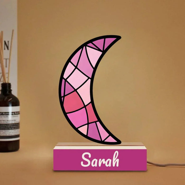 Personalized crescent moon night light with pink stained-glass design and wooden base, Sarah