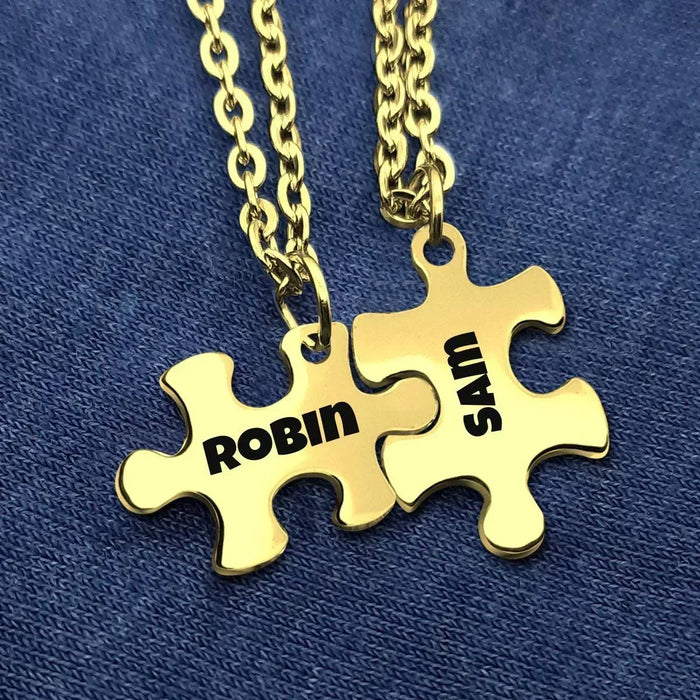 Gold engraved puzzle pendant necklace with two name charms on chain