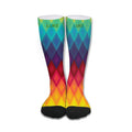 Mid-calf rainbow socks with chevron pattern, black toe and heel, branded cuffs