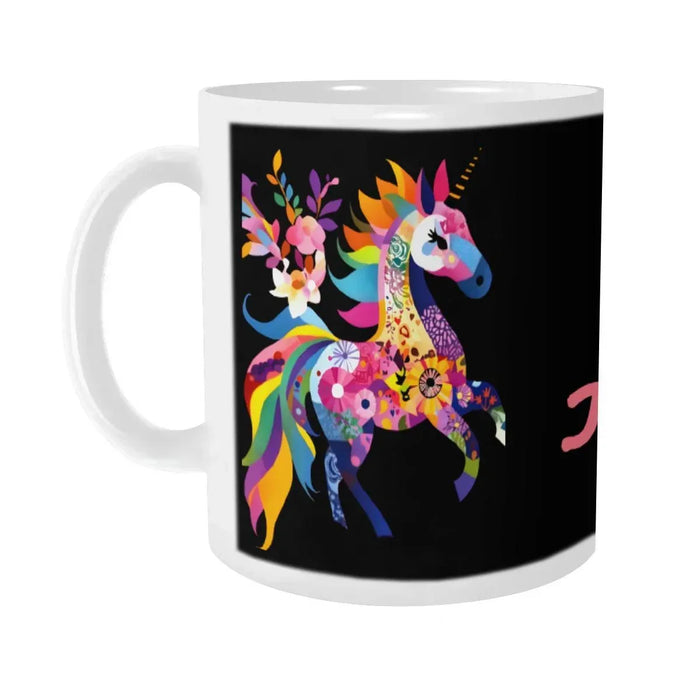Black ceramic mug with rainbow unicorn graphic and floral bouquet, white handle