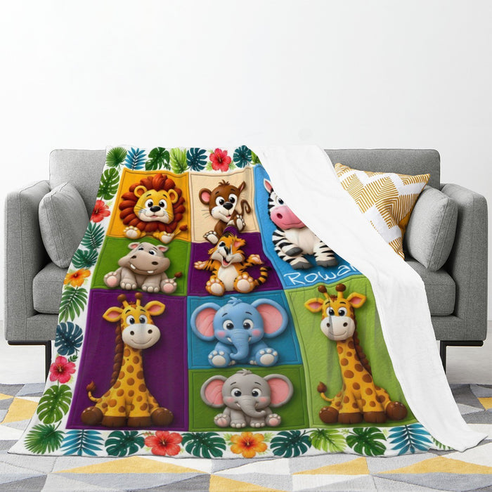 Safari animal blanket draped on sofa, multicolor squares with lion, zebra, elephant, giraffe