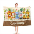 Safari animal blanket with white top, brown hem, and CAMERON name in large letters