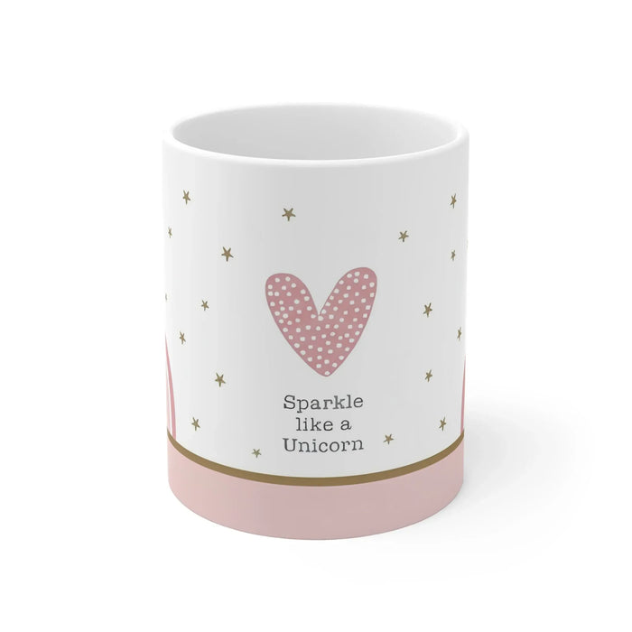 White ceramic mug with pink heart and sparkle text, gold star accents