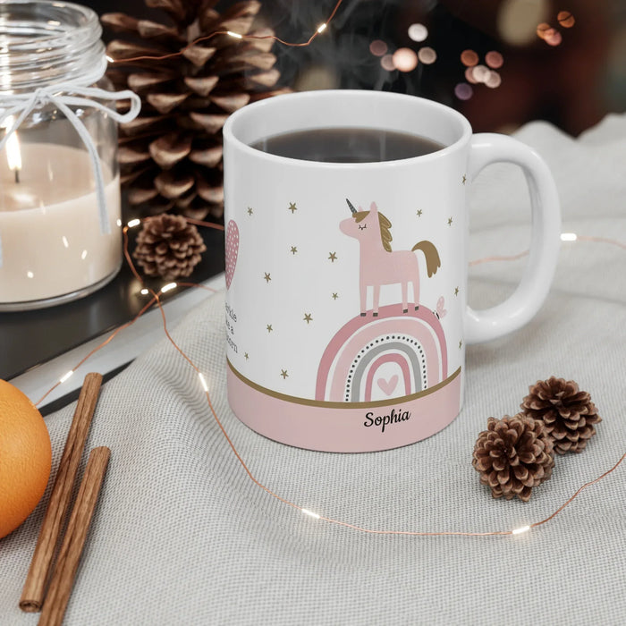 White ceramic mug with unicorn rainbow graphic and name Sophia